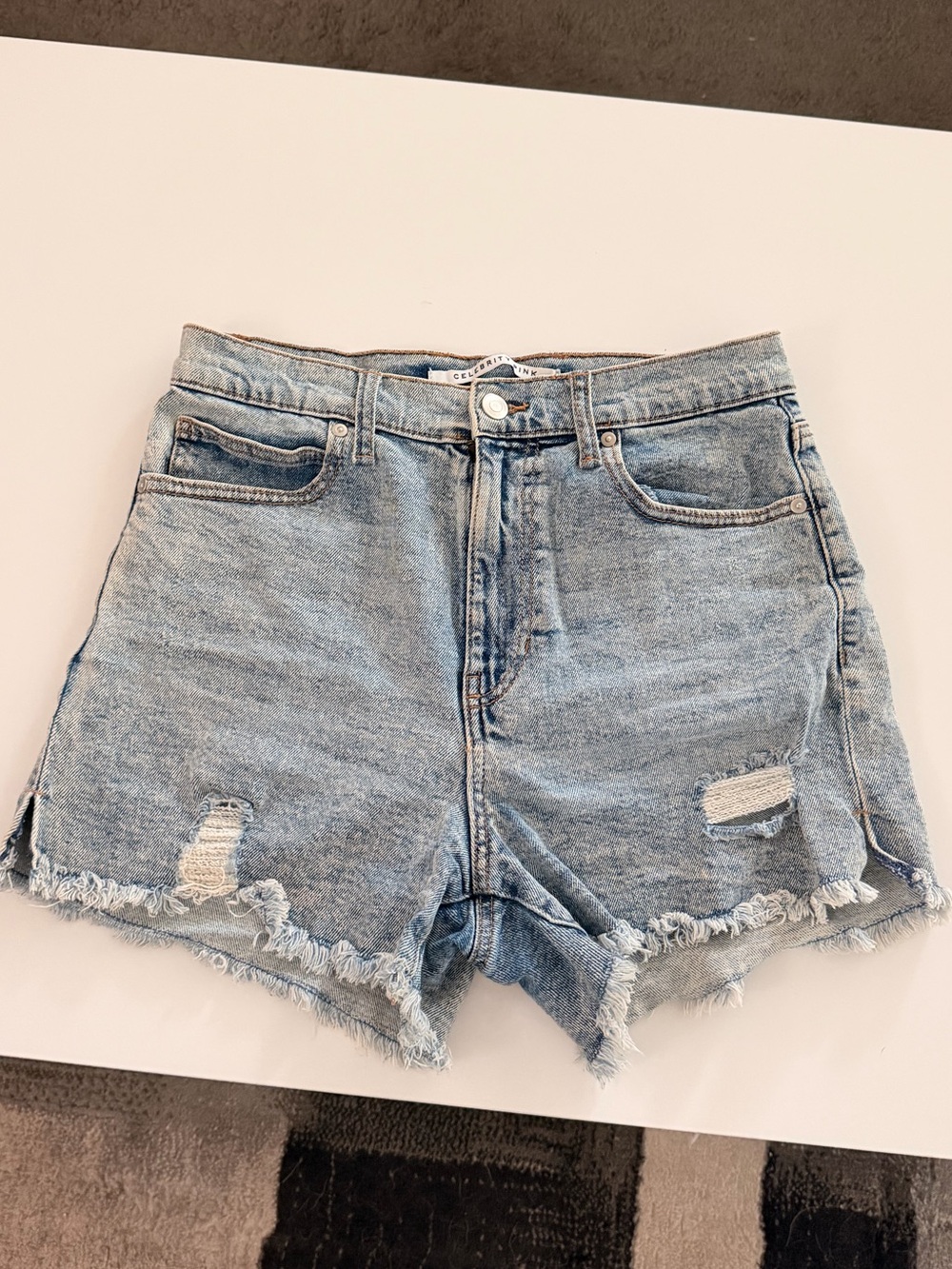 Women’s Light Blue Distressed Denim Shorts
